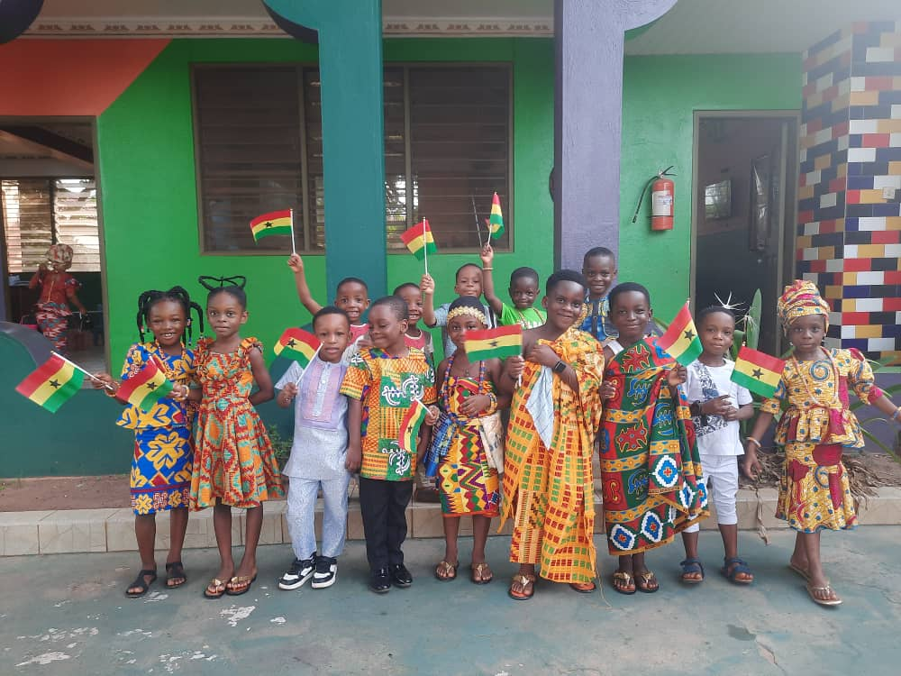 Whole class dressed for Traditional Day